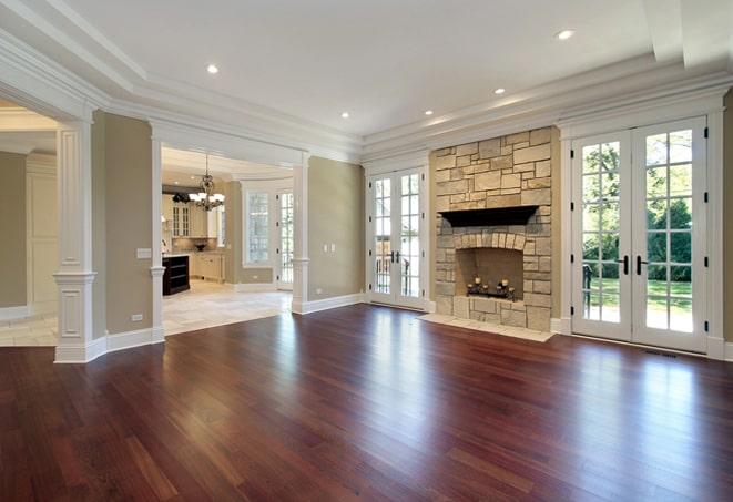 wide planks of richly stained hardwood flooring